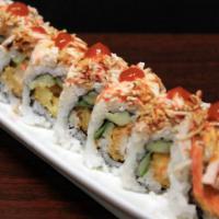 Butterfly Special Cooked Roll · Shrimp tempura and cucumber topped with crab salad, eel sauce, and hot sauce.