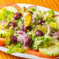 House Salad · Mixed lettuce, tomatoes, cucumbers, onions, olives.
