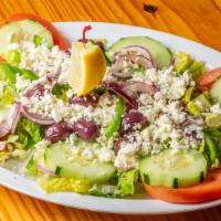 Greek Salad · Mixed lettuce, tomatoes, cucumbers, onions, Kalamata olives, green peppers, feta cheese.
