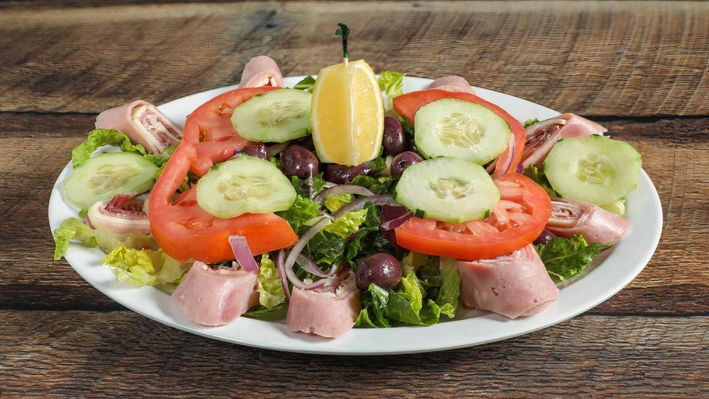 Antipasto Salad · Lettuce, tomatoes, cucumbers, onions, olives, salami, capicola, ham, Provolone cheese.