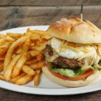Out Of This World Burger · Sunny side up egg and potato sticks.