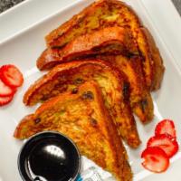 French Toast · Thick sliced challah bread coated with the VBC special recipe, including cinnamon, vanilla, ...