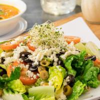 Greek Salad · lettuce, red onions, tomatoes, feta cheese, green & black olives & Greek dressing on the side