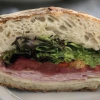 Italian Cold Cuts · Parmacotto ham, Salamino, Mortadella, Provolone Cheese, Mix Greens, Roasted Peppers and Toma...