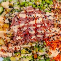 Poke - Raw Tuna · Topped with raw ahi tuna. Served with your choice of brown rice OR quinoa, arugula, pineappl...