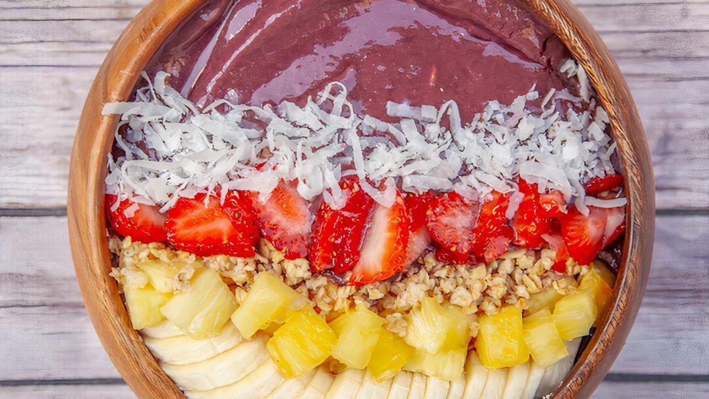 Sproutz Acai Bowl · Organic Brazilian Acai topped w/ banana, strawberry, pineapple, coconut flakes granola & honey.  CHOOSE BASE: Original acai blended with banana, mango, water & honey OR Acai, guarana & organic sugar