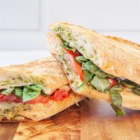 Panini - Tomato Mozzarella · Toasted white baguette with pesto sauce, arugula , tomatoes &. fresh mozzarella