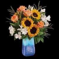 Sunflower Beauty Bouquet · This magnificent arrangement of golden sunflowers and orange roses, presented in a hand-blow...