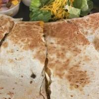 Shrimp Quesadilla · Choose grilled or blackened shrimp in a large cheesy quesadilla. Served with house made mang...