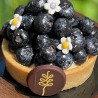 Blueberry Tart (Gf) · Almond tart filled with vanilla pastry cream and raspberry jam.
Gluten-free.
