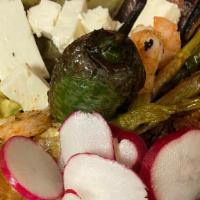 Molcajete / Mexican Grill Mix · Served with : steak, chicken, shrimp, Mexican sausage, captus, onion’s cambray, radishes, pe...