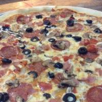 Brunette Pizza · Ham, mushrooms and black olives.
