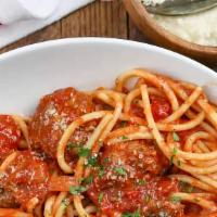 Spaghetti Meatballs · Homemade red sauce topped with three large beef meatballs. Includes three garlic breads.