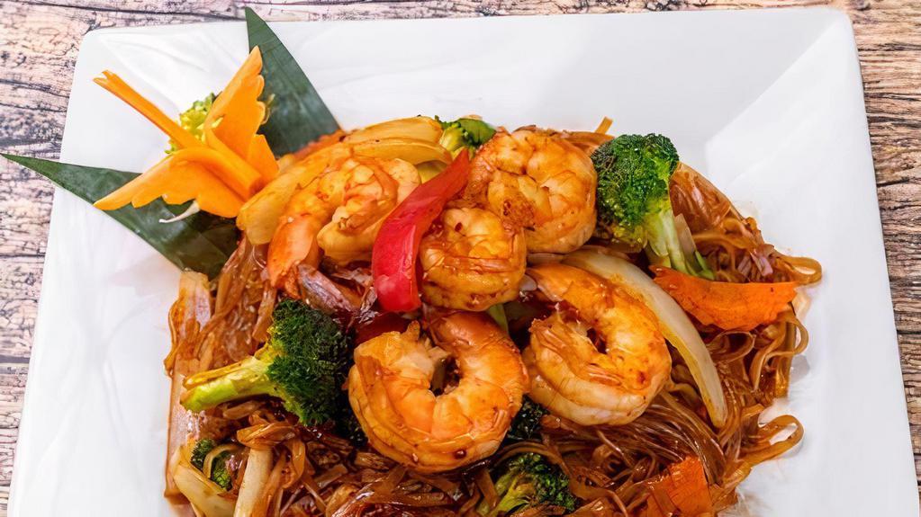 Lava Noodles · Sautéed rice noodles, mixed veggies in a roasted chili paste. Choose your spice level: medium, hot, Thai hot or inferno.