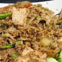Fried Rice · Stir-fried rice, egg, onions, carrots, green peas and green onion.
