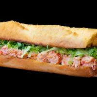 Lobster Classic · Lobster & seafood salad with shredded lettuce on butter-toasted bread