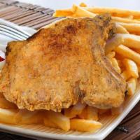 Pork Chop & Fries · Fried pork chops (crispy and delicious!), tender and juicy served with seasoned French fries.