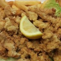 Fried Conch · Fried conch and fries.