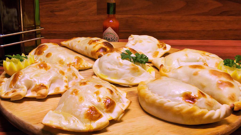 Empanadas (2) · Oven baked you option ham and cheese, chicken, meat, spinach or caprese.