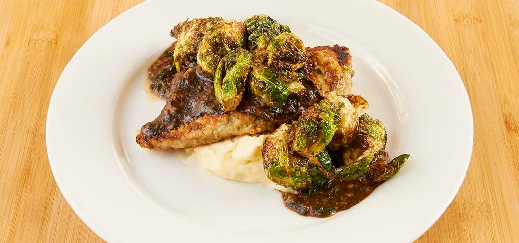 Pan-Roasted Chicken · Local. Coleman Natural chicken breast, goat cheese mashed potatoes, herbed demi-glace, crispy Brussel sprouts.