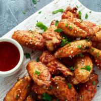 8 Wings (Choose Flavor) · Bone-in or boneless with side dipping sauce.