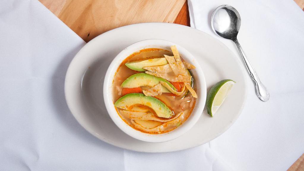 Maya Soup · Shredded chicken seasoned with our special sauce, chicken broth, rice, zucchini, squash and carrots. Topped with avocado and tortilla strips.