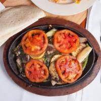 Veggie Fajitas · Sautéed mushrooms, zucchini, squash, spinach, onions, bell pepper and tomatoes. Served will ...