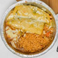Enchiladas Verdes · Three corn tortillas slightly pan-fried, filled with shredded beef, and topped with salsa ve...
