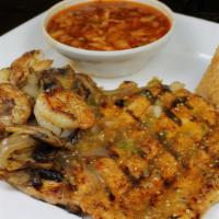 Pollo Con Camaron · Chicken and shrimp cooked with onions and mushrooms. Served with rice and charro bean soup
