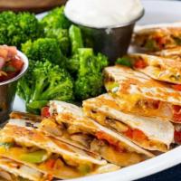 Quesadilla De Vegetales · Fresh vegetable, sauteed mushrooms, onions, peppers, mixed cheese, tomatoes, and broccoli mi...