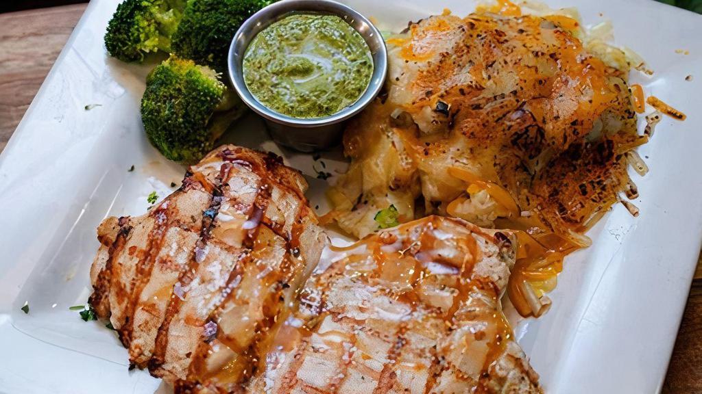 Pollo Con Salsa De Cilantro · Wood grilled chicken breast (10 oz). Served with mashed potato loaded with corn and melted cheese, both topped with cilantro sauce and side of broccoli.