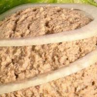 Chopped Liver Appetizer · A generous scoop of traditional Jewish chopped chicken livers served on a bed of lettuce, wi...