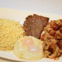 Calentado · A favorite Colombian breakfast mix of white rice, red beans and cut pork belly.

Consuming r...