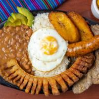 Bandeja Paisa · The ''paisa'' platter combines with white rice, red beans, ground or top round steak, sweet ...