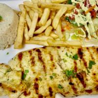 Pollo A La Plancha · Thinly cut chicken breast, marinated and wood-grilled. Served with white rice, French fries ...