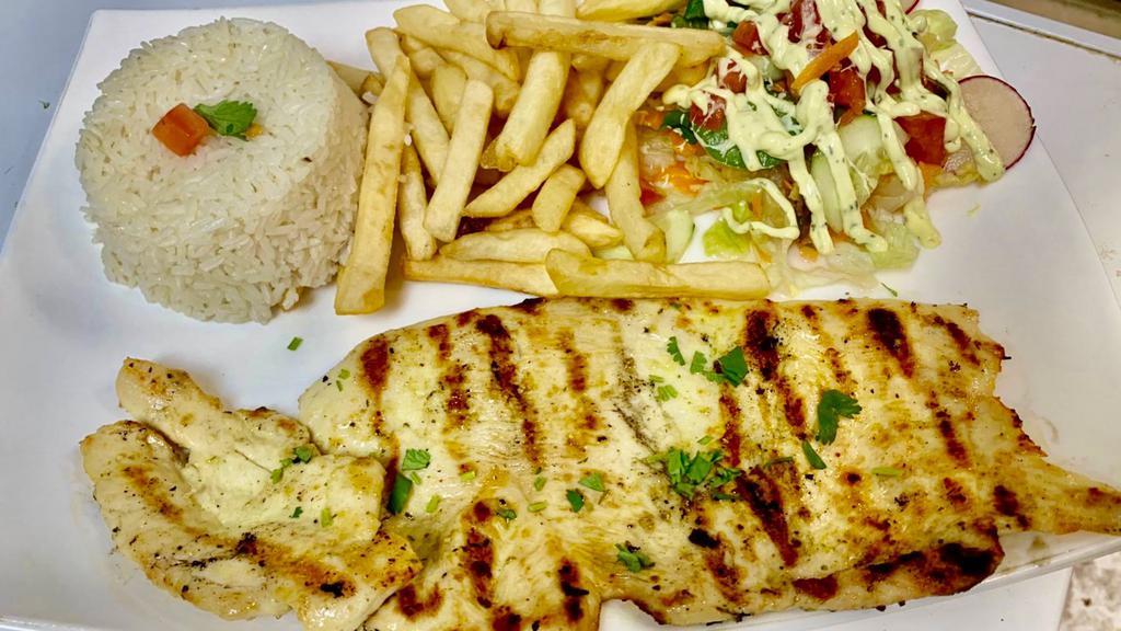Pollo A La Plancha · Thinly cut chicken breast, marinated and wood-grilled. Served with white rice, French fries and salad.
