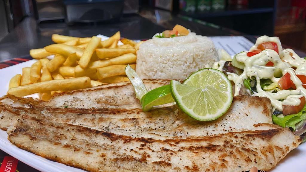Filete De Swai A La Plancha · Grilled swai filled. Served with rice, green plantain and salad.