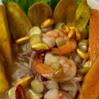 Ceviche Mixto · Seafood and fish marinated in lime juice with red onions, cilantro with Peruvian rocoto
pepp...