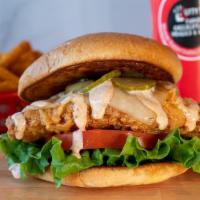 Original Fried Chicken Sandwich · Breaded fried chicken breast, pepper jack cheese, leaf lettuce, tomato, pickles & mayo, on a...