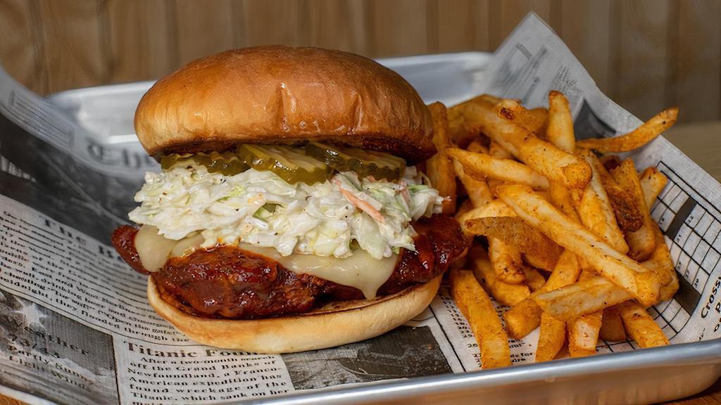 Rocky'S Choice Nashville Hot · Crispy Fried Chicken Breast Coated in Nashville Hot Sauce, Pepper Jack Cheese, Coleslaw, & Pickles on a Grilled Brioche Bun