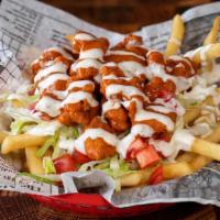 Buffalo Ranch Loaded Fries · Fries loaded with fried popcorn chicken tossed in buffalo sauce, shredded cheddar cheese, sh...
