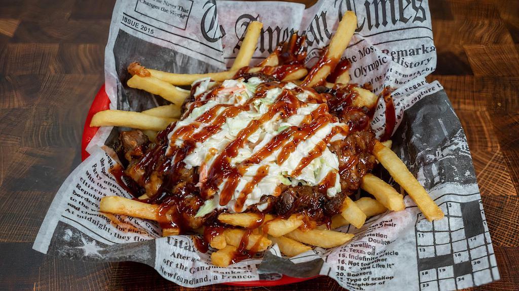 Brisket Loaded Fries · Fries with Brisket Burnt Ends, Carolina Reaper Cheese, Coleslaw, and BBQ Sauce..