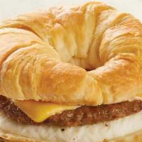 Sausage, Egg & Cheese Breakfast Sandwich · A buttery biscuit with sausage, fried egg, and cheese.