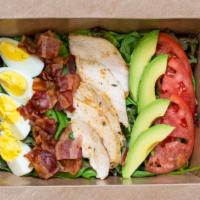House Cobb Salad · Chopped salad greens, tomato, crisp bacon, roasted chicken breast, hard boiled egg, avocado,...