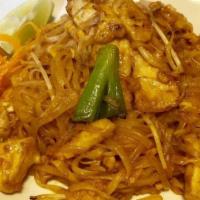 Pad Thai · Thin rice noodle stir-fry with chicken, shrimp, green onion, sprout, egg and crushed peanut ...