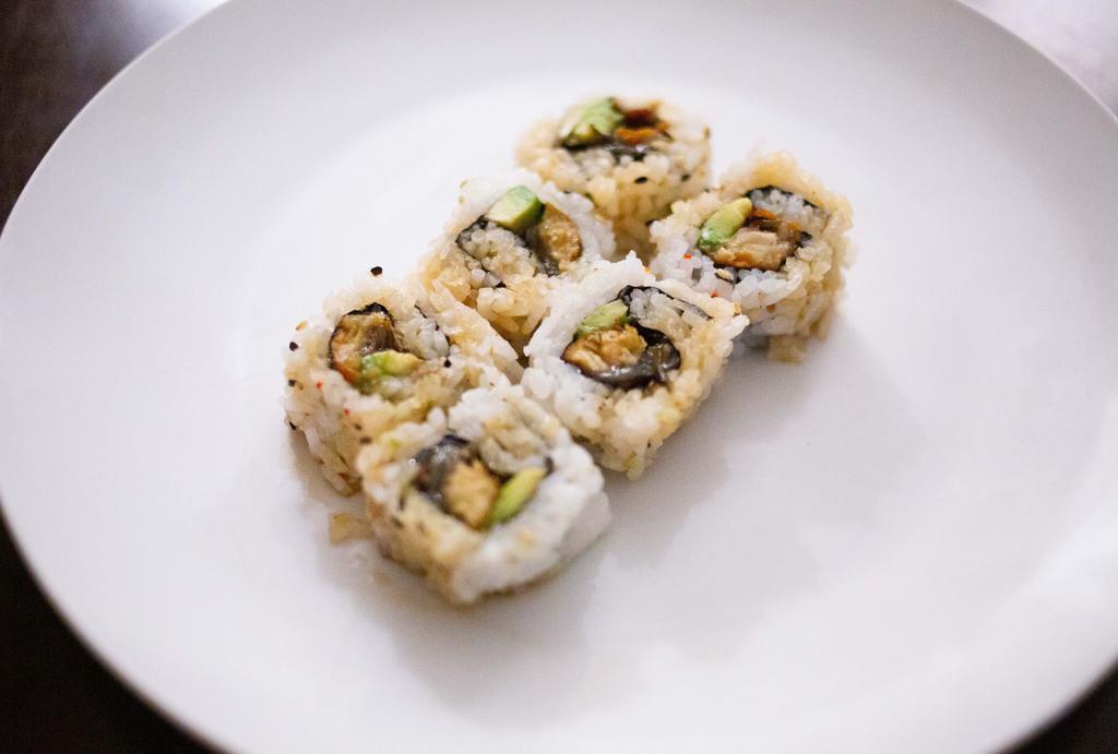 Rock & Roll · Fresh water eel and avocado. Fresh seafood rolled in sushi rice and seaweed topped with sesame seeds.