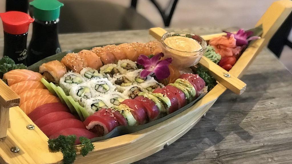 Love Boat55 · Salmon four pieces
tuna four pieces
California roll six pieces
rock and roll six pieces
volcano roll eight pieces
super crunch eight pieces.

**cannot substitute**