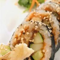 Spider Roll · Crispy soft shell crab, cucumber, and masago. Fresh seafood rolled in sushi rice and seaweed...