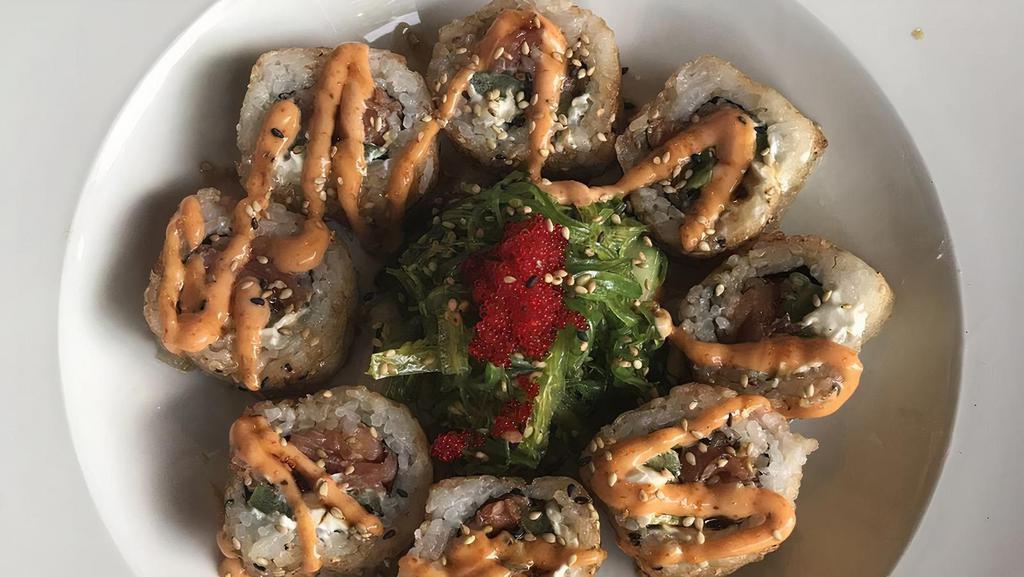 Bagel Roll · Smoked salmon, cream cheese, and scallions. Fresh seafood rolled in sushi rice and seaweed topped with sesame seeds.