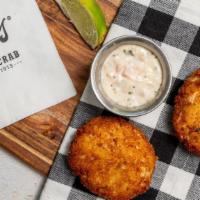 Jumbo Lump Crab Cakes · 2 crab cakes served with green caper tomato remoulade